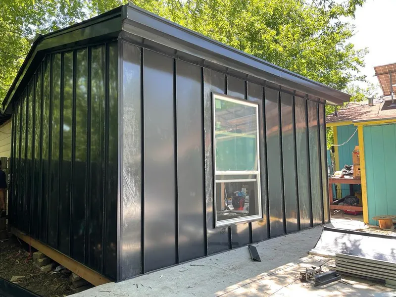 Black standing seam metal wall panels for Roof Inspection in Ledyard