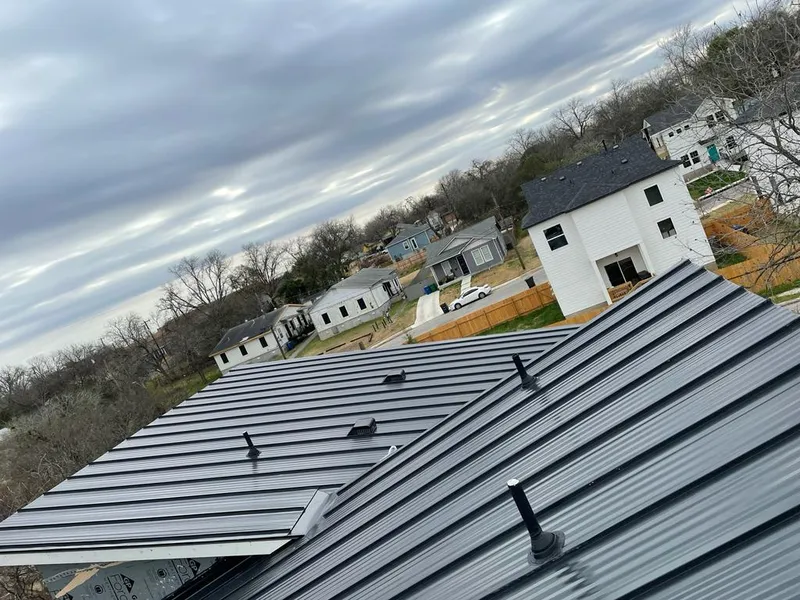 Standing seam metal roof panels with vents for Skylight Repair in Ledyard